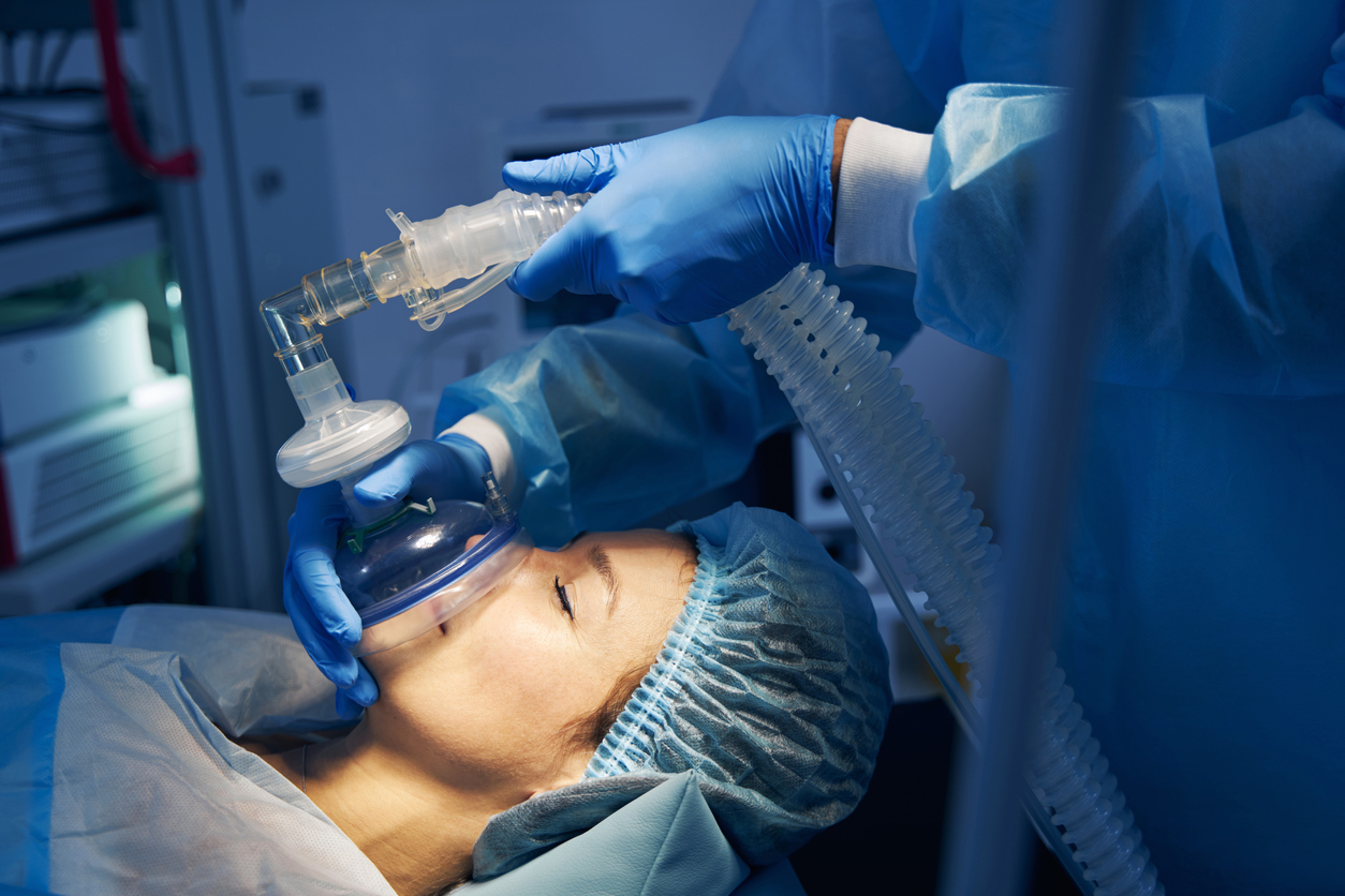 Woman on an operation table getting anesthesia